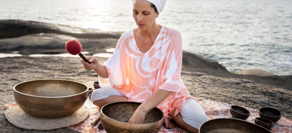 Meditation guide with singing bowls in Finland